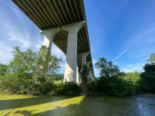 A large concrete bridge stays strong and safe thanks to J&P Coatings protection work.