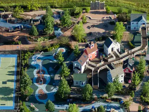 This image shows how J&P Coatings helped make a playground safer and more welcoming with strong patio coatings for everyone.