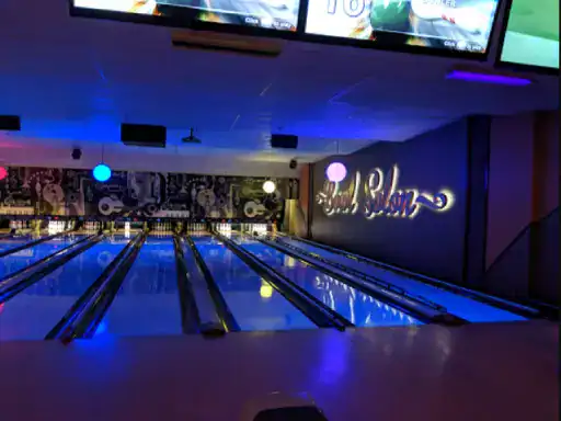 A modern bowling alley with a polished look, showing the quality finish possible with J&P Coatings.