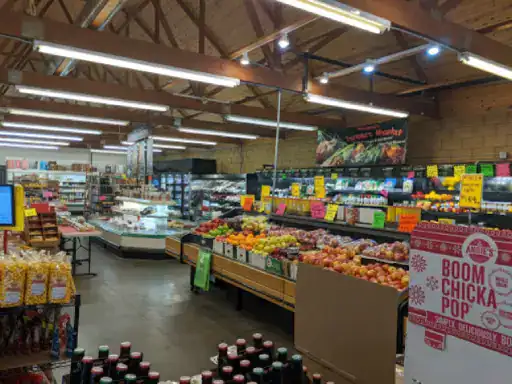 A clean, well-organized grocery store shows the work of J&P Coatings, a flooring and coatings company in Ohio. Alt text: Grocery store with floors done by J&P Coatings in Ohio.