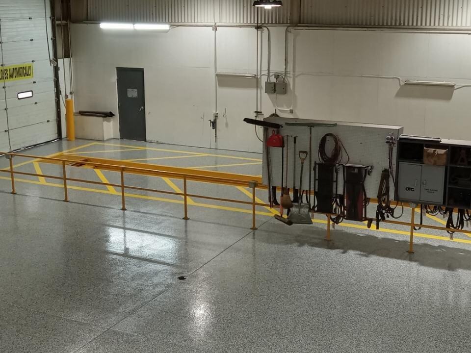 J&P Coatings creates safe and organized industrial workspaces with polished floors and clear safety markings.