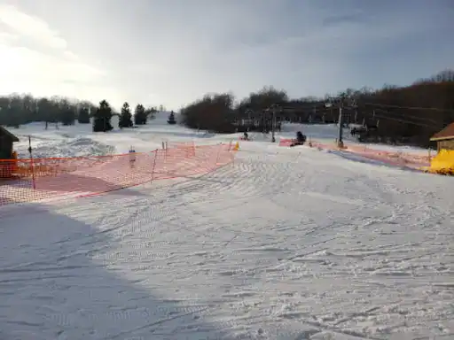 A ski slope on a sunny day shows how J&P Coatings can make patios smooth, safe, and ready for fun.