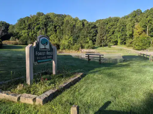 A welcoming park sign at Forest Ridge Village Park shows a friendly spot near J&P Coatings in Ohio.