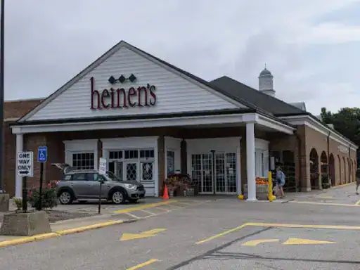The image shows a busy Heinen’s grocery store entrance. J&P Coatings can keep walkways strong and looking good for shoppers.