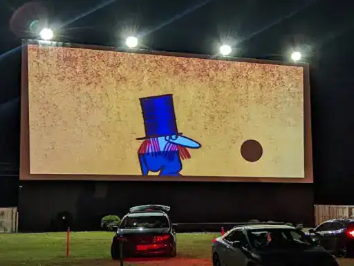 A fun movie is showing at a drive-in, making the night special for everyone there. J&P Coatings makes basement floors just as exciting and special.