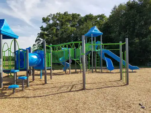 A fun and safe playground invites children to play, while J&P Coatings patio work keeps outdoor areas strong and long-lasting.