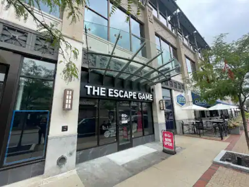 The image shows J&P Coatings near busy restaurants and a local flooring contractor, giving a welcoming feel to the area. The businesses look open and inviting for visitors.