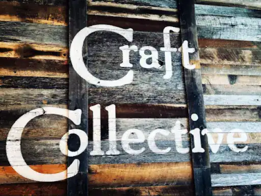 The image shows the words Craft Collective painted in white on old wood, showing J&P Coatings&rsquo; focus on handmade and quality work.