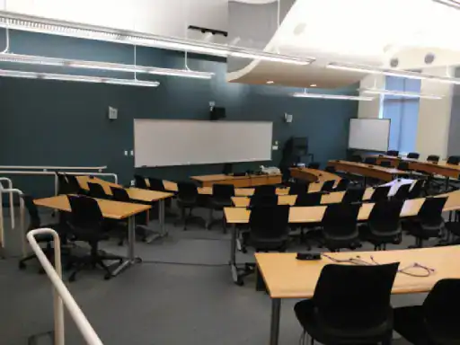 A bright and tidy classroom with smooth, well-installed flooring by J&P Coatings. The space looks ready for learning.