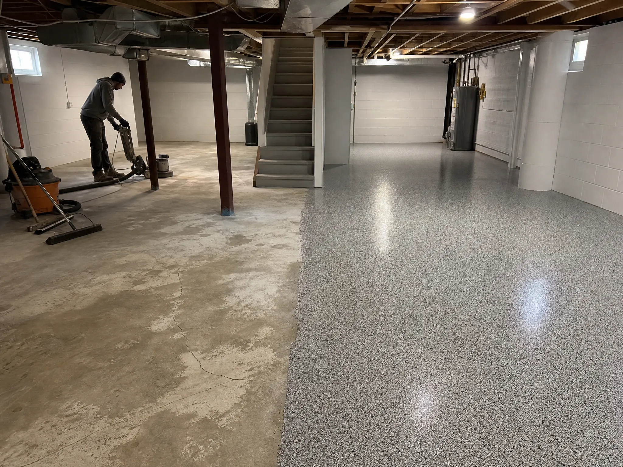J&P Coatings makes a basement floor look new, with one half unfinished and the other covered in smooth epoxy for a big change.