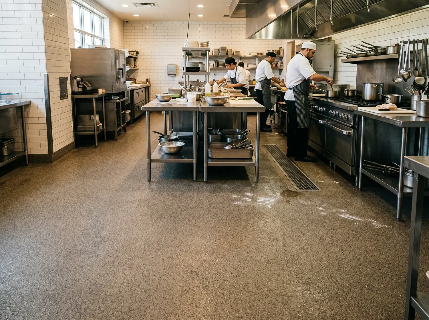 J&P Coatings keeps kitchens safe and clean, even in busy spaces where spills might happen during cooking.