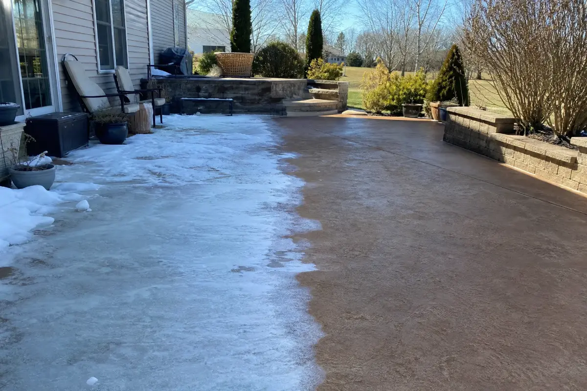 This J&P Coatings patio shows how their surfaces handle both snow and clear weather at the same time.