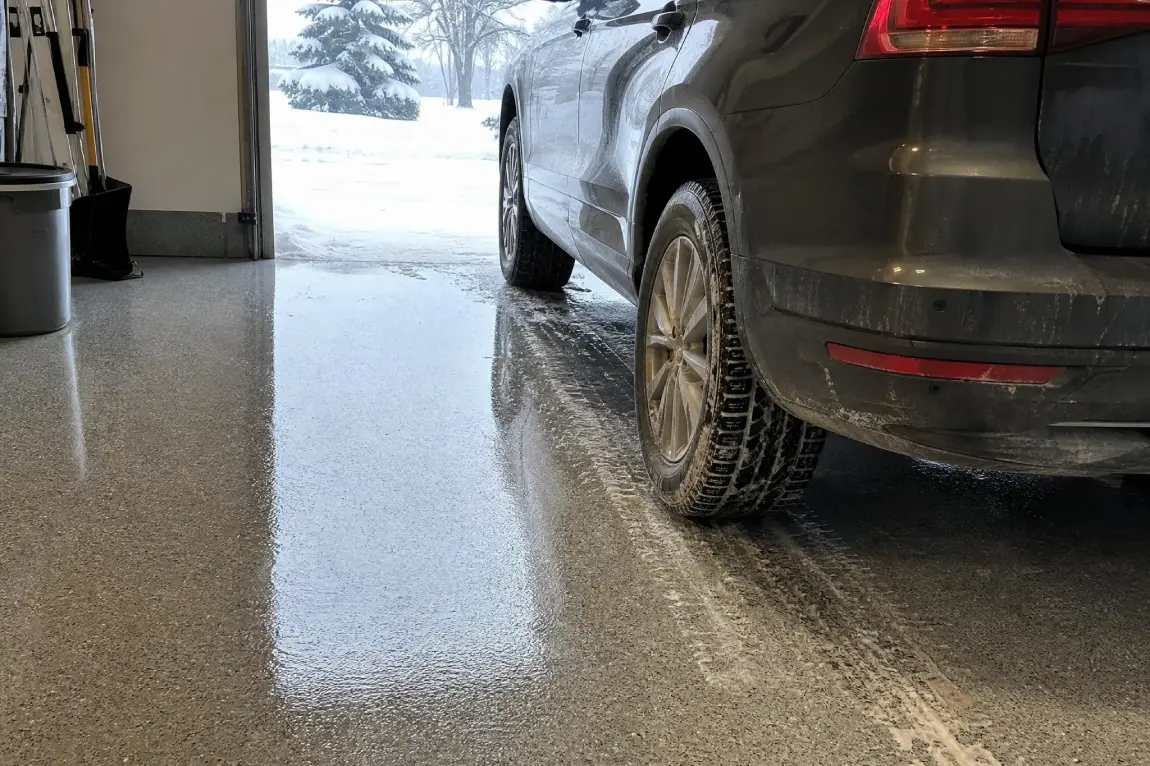 A J&P Coatings garage floor stays clean and shiny, even when cars come in with snow from outside.