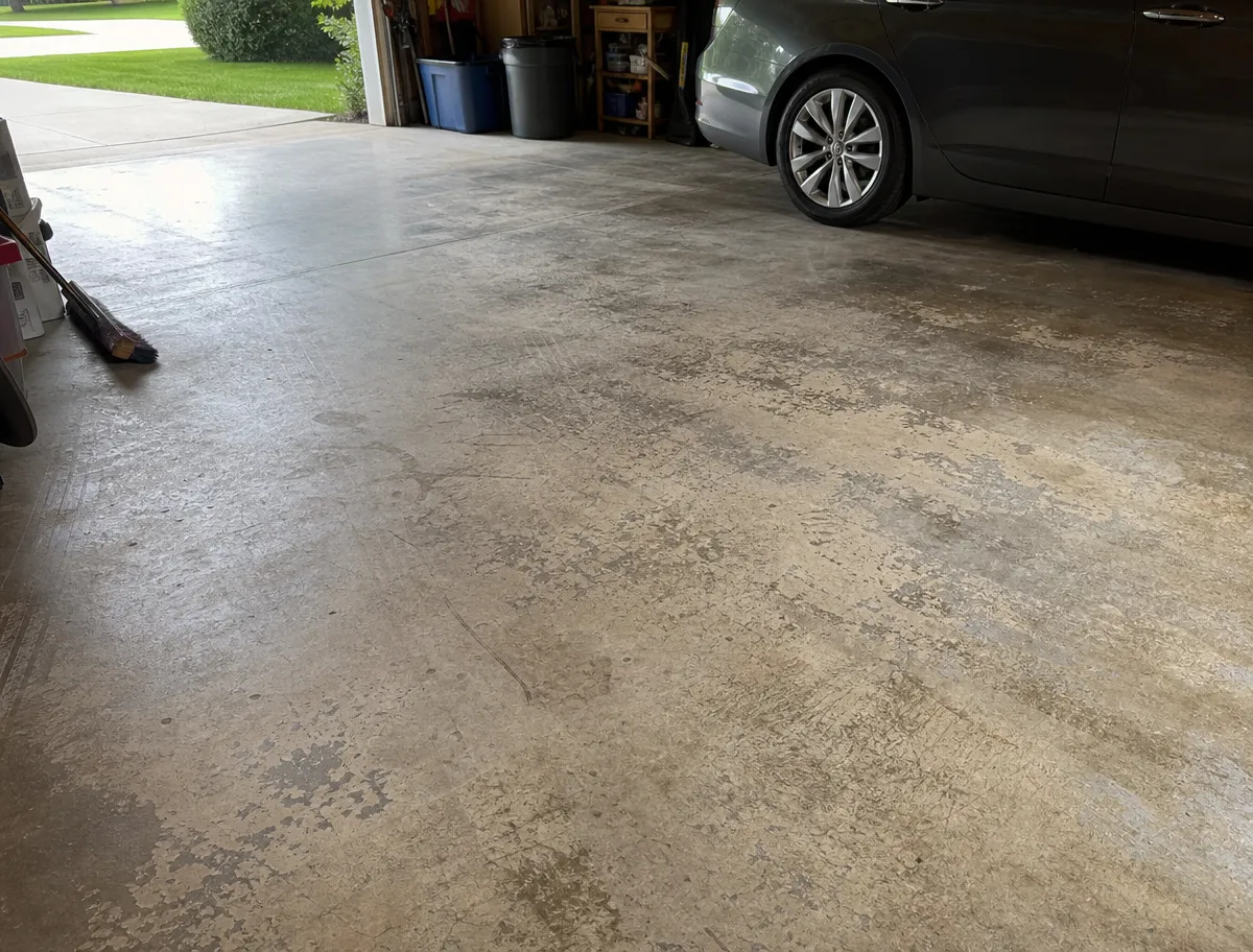 A J&P Coatings garage shows neatness and space, with easy access to storage and parking for a family car.